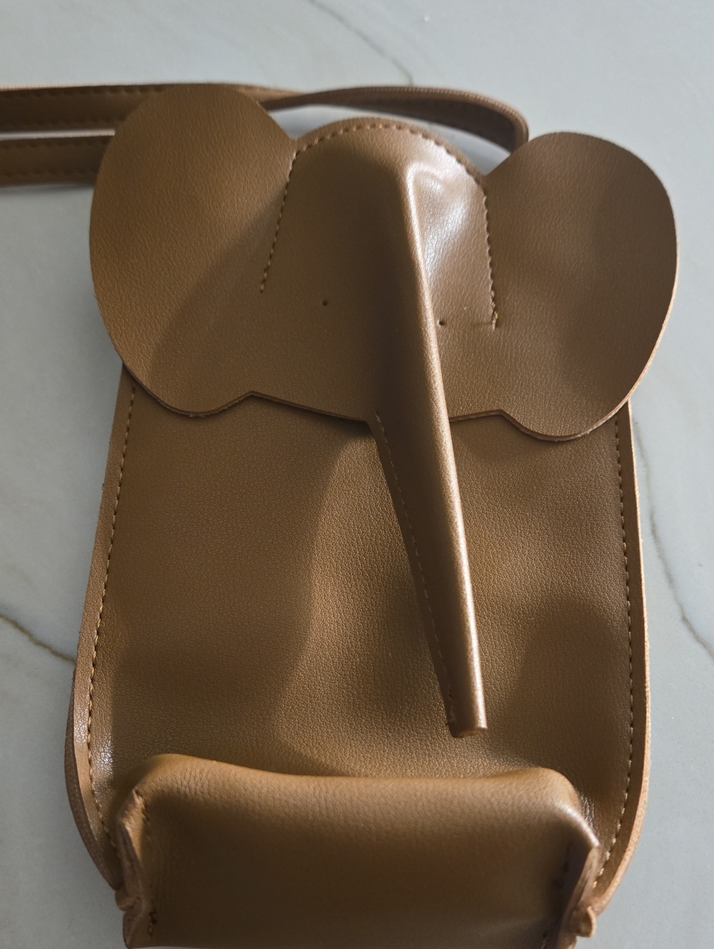 Elephant crossbody bags. 7.5" Brown Just in..1 avail. Look and feel of lea…